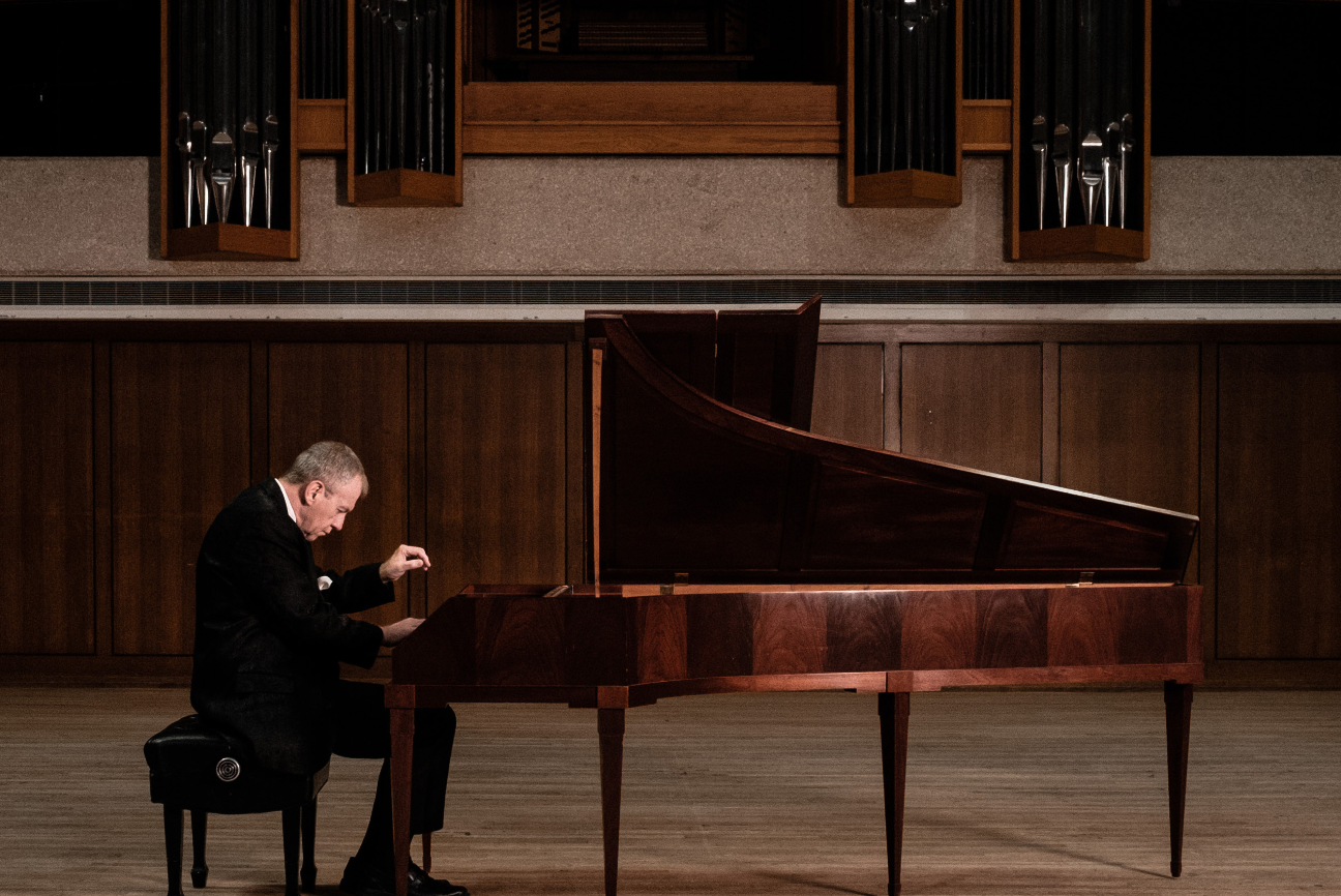 Anton Nel playing piano in Bates Recital Hall; photo by Nathan Russell