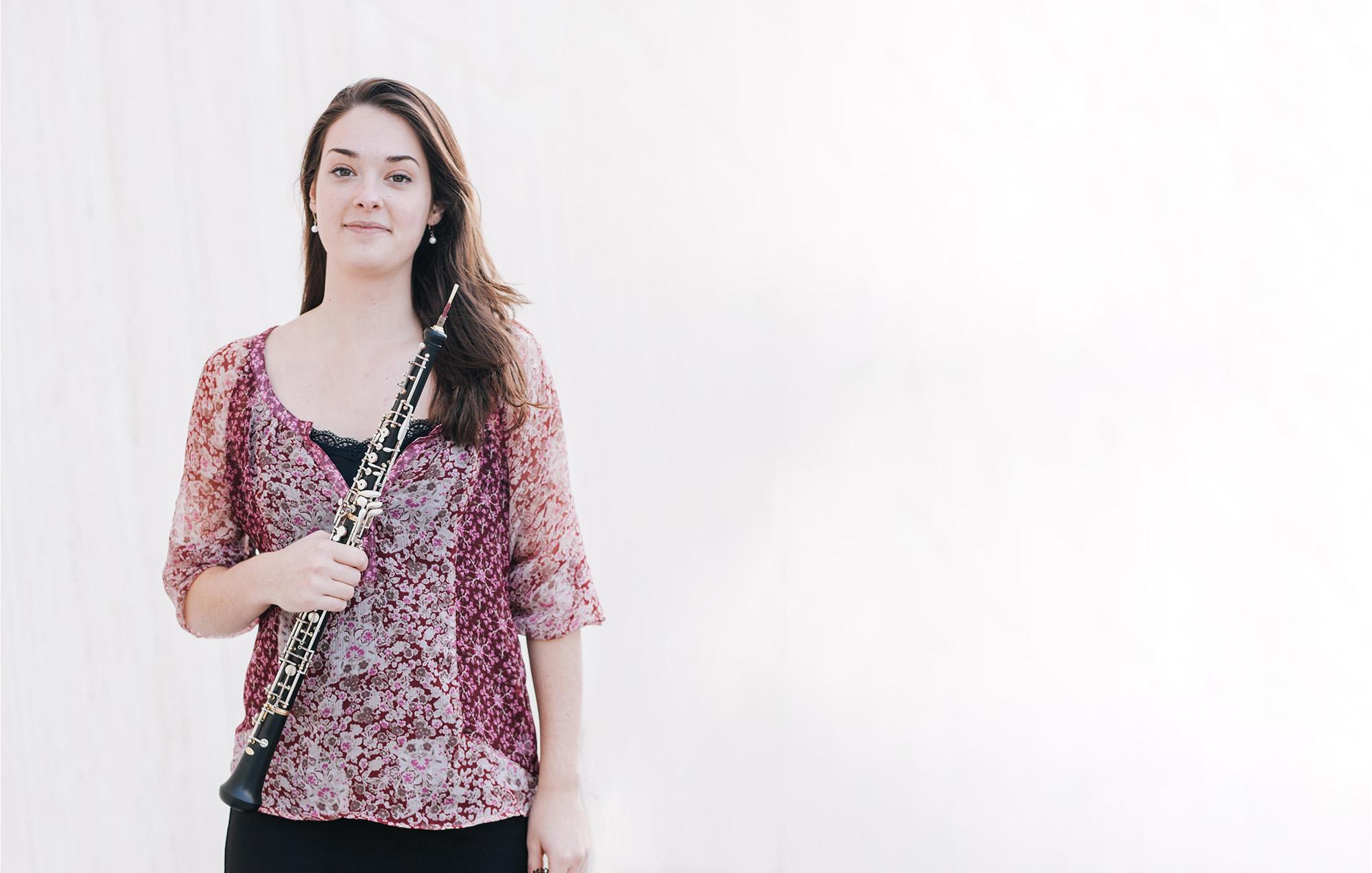 an oboe student with her instrument
