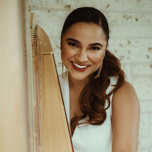 McHenry poses with her harp