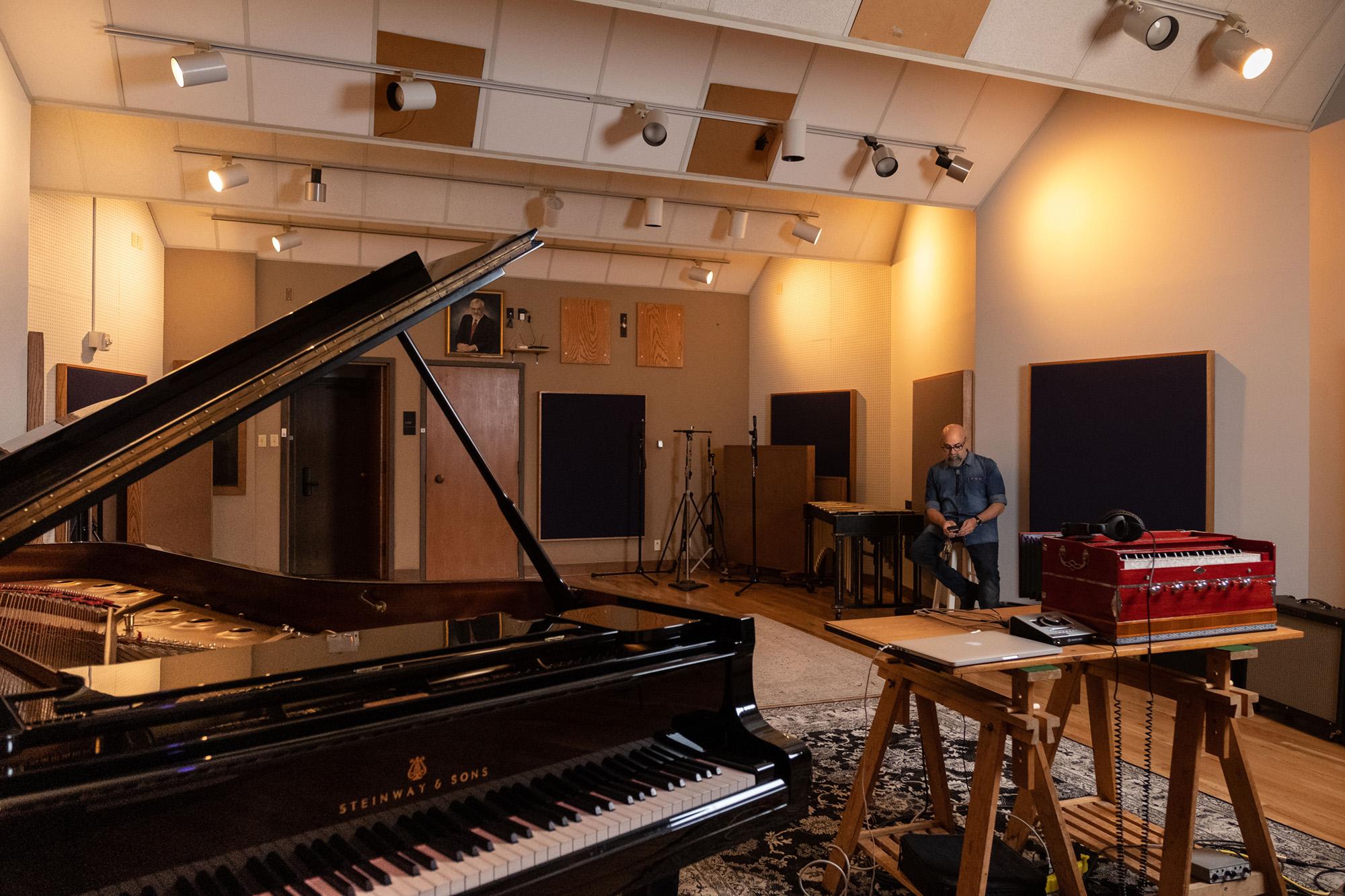 Andrew Stoltz sits among newly renovated Live Room