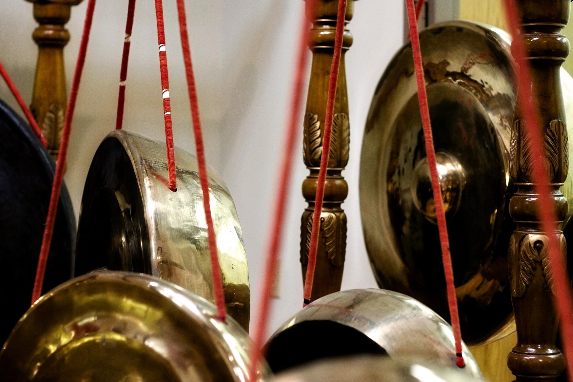 a close up of Gong Ageng hanging in the Gamelan room