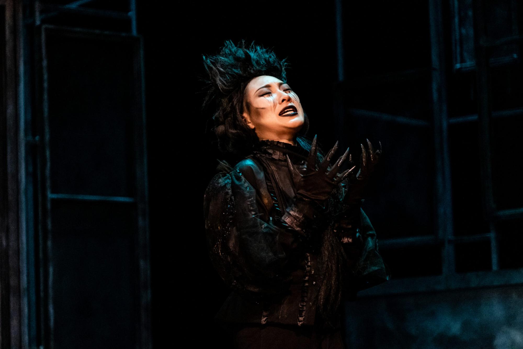 A female ghost cries out