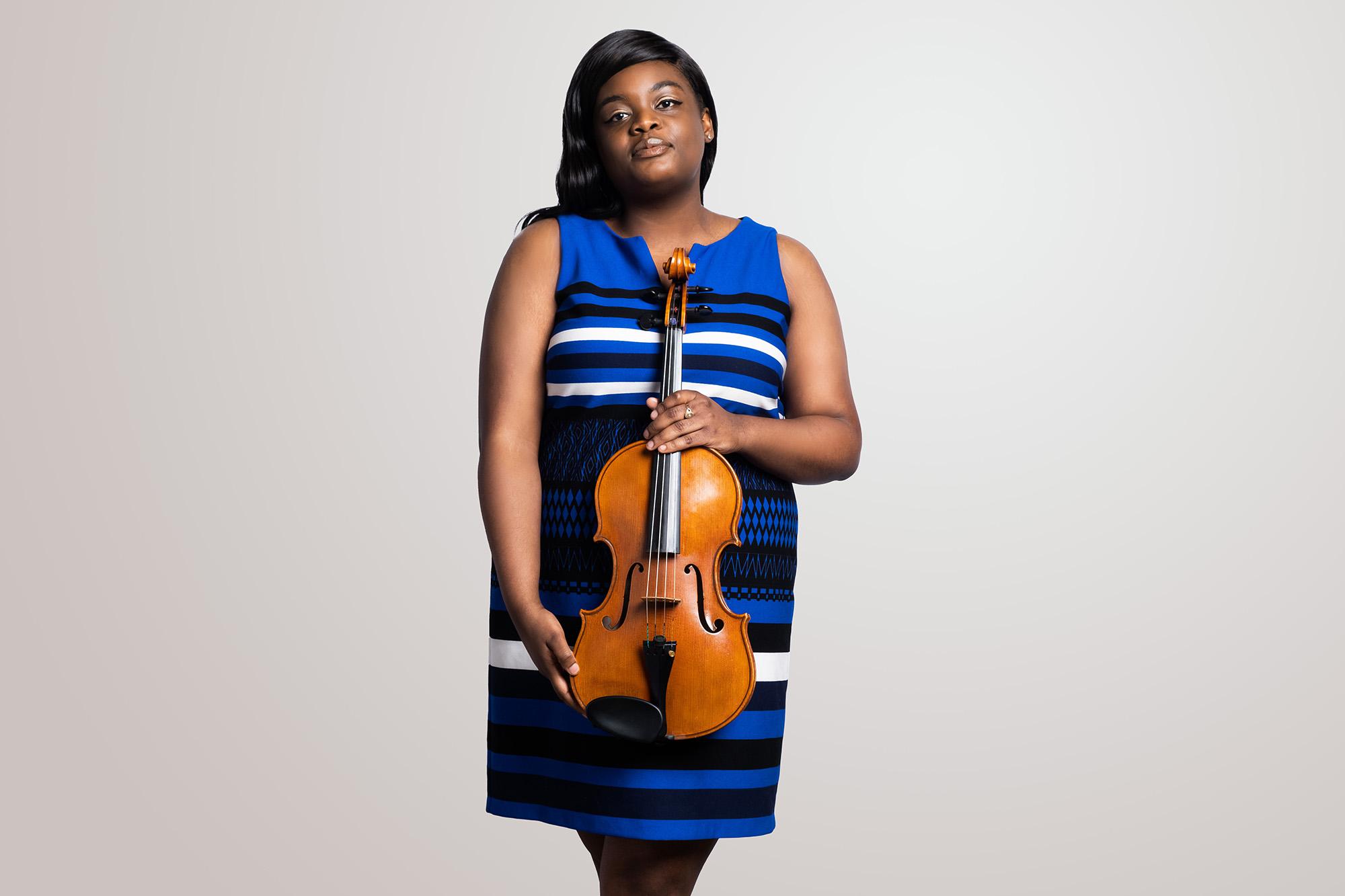 a violist with her instrument