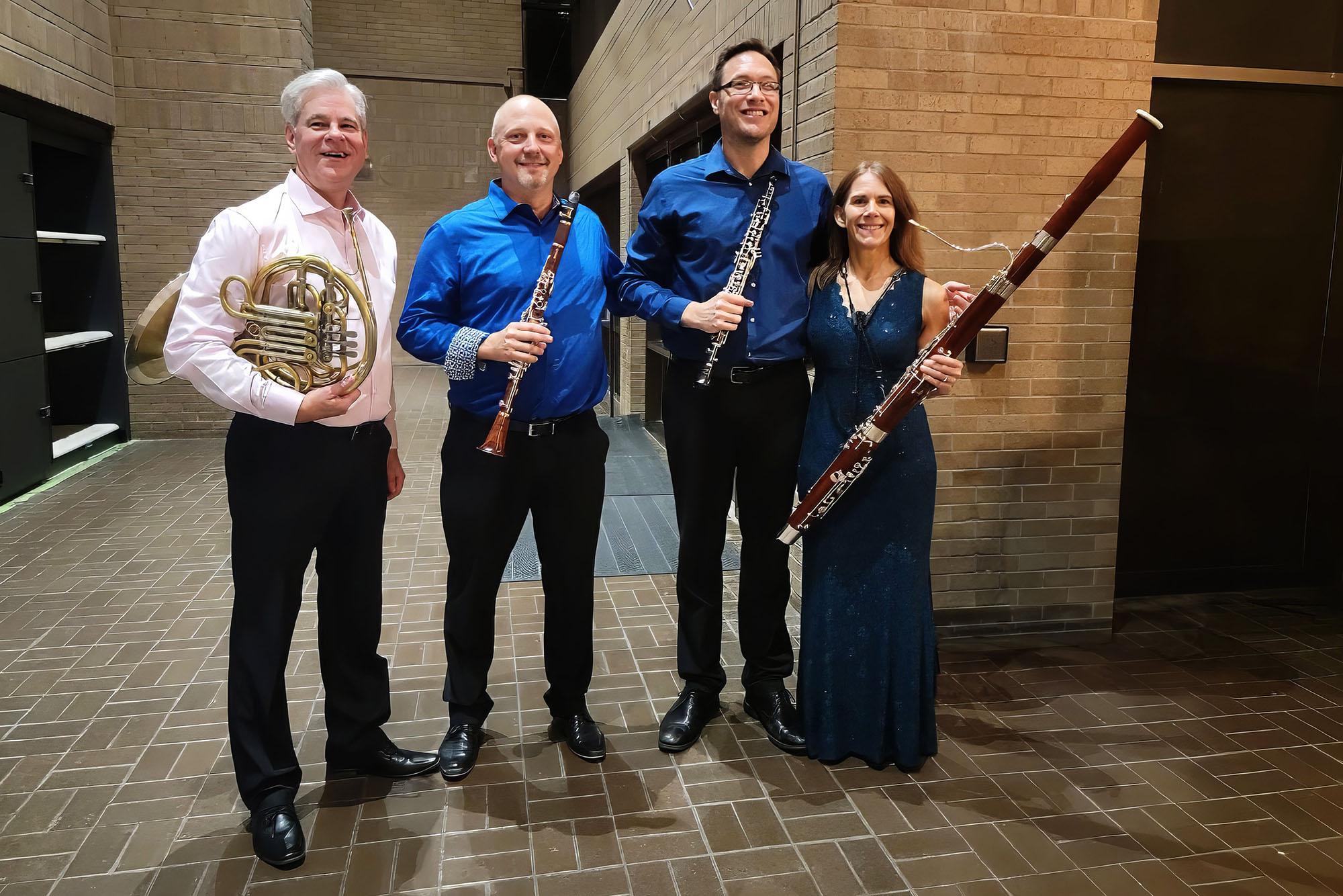 Kristin wolf Jensens with fellow faculty members Patrick Hughes, Jonathan Gunn and Andrew Parker outside of Bates Recital Hall after a concert