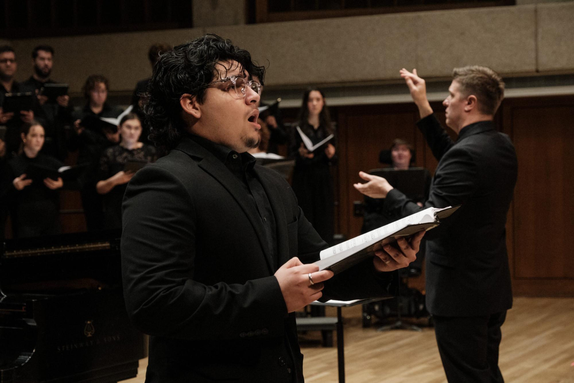 concert chorale performs on the Bates stage.