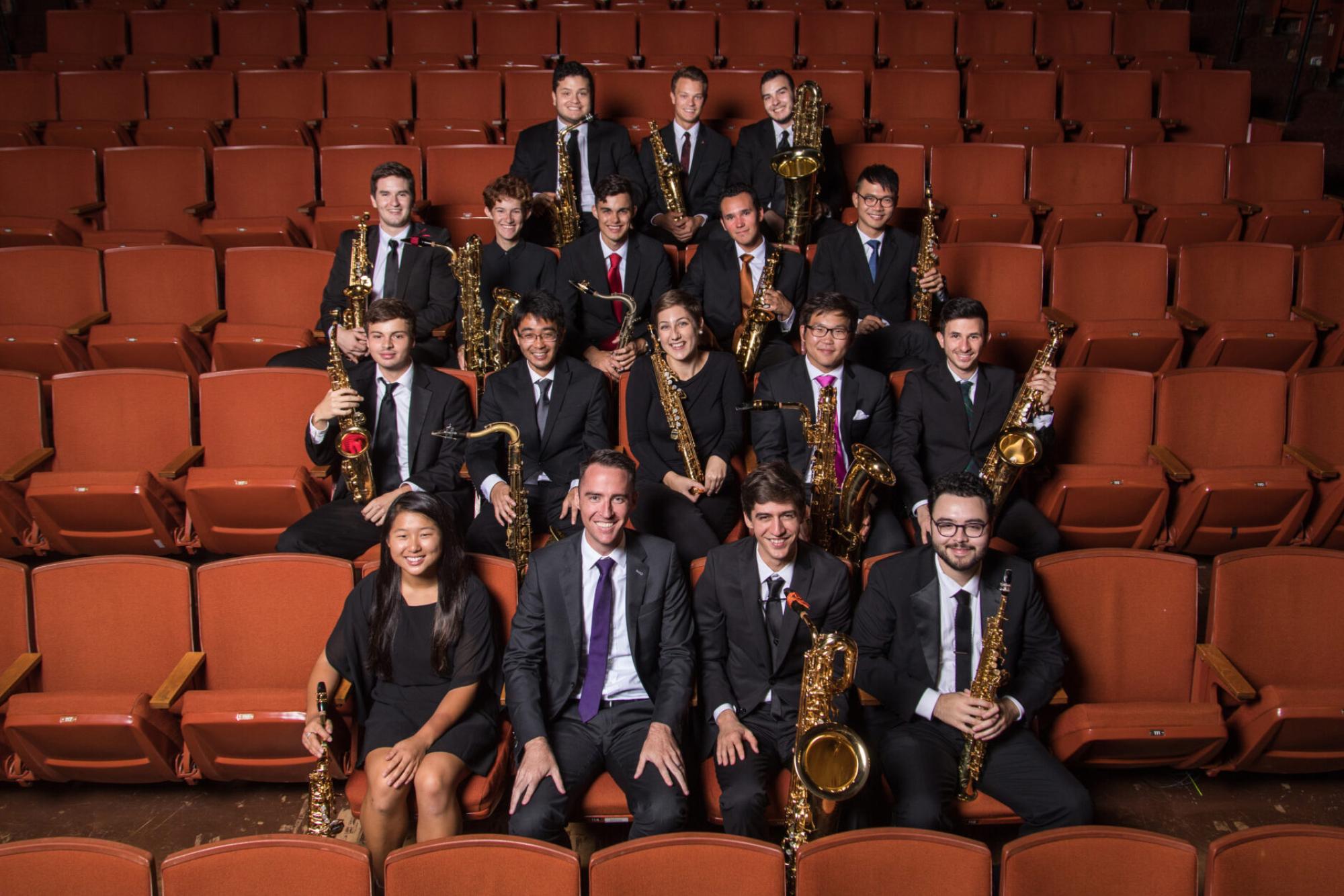 The UT Saxophone Studio sitting in audience seats in Bates Recital Hall