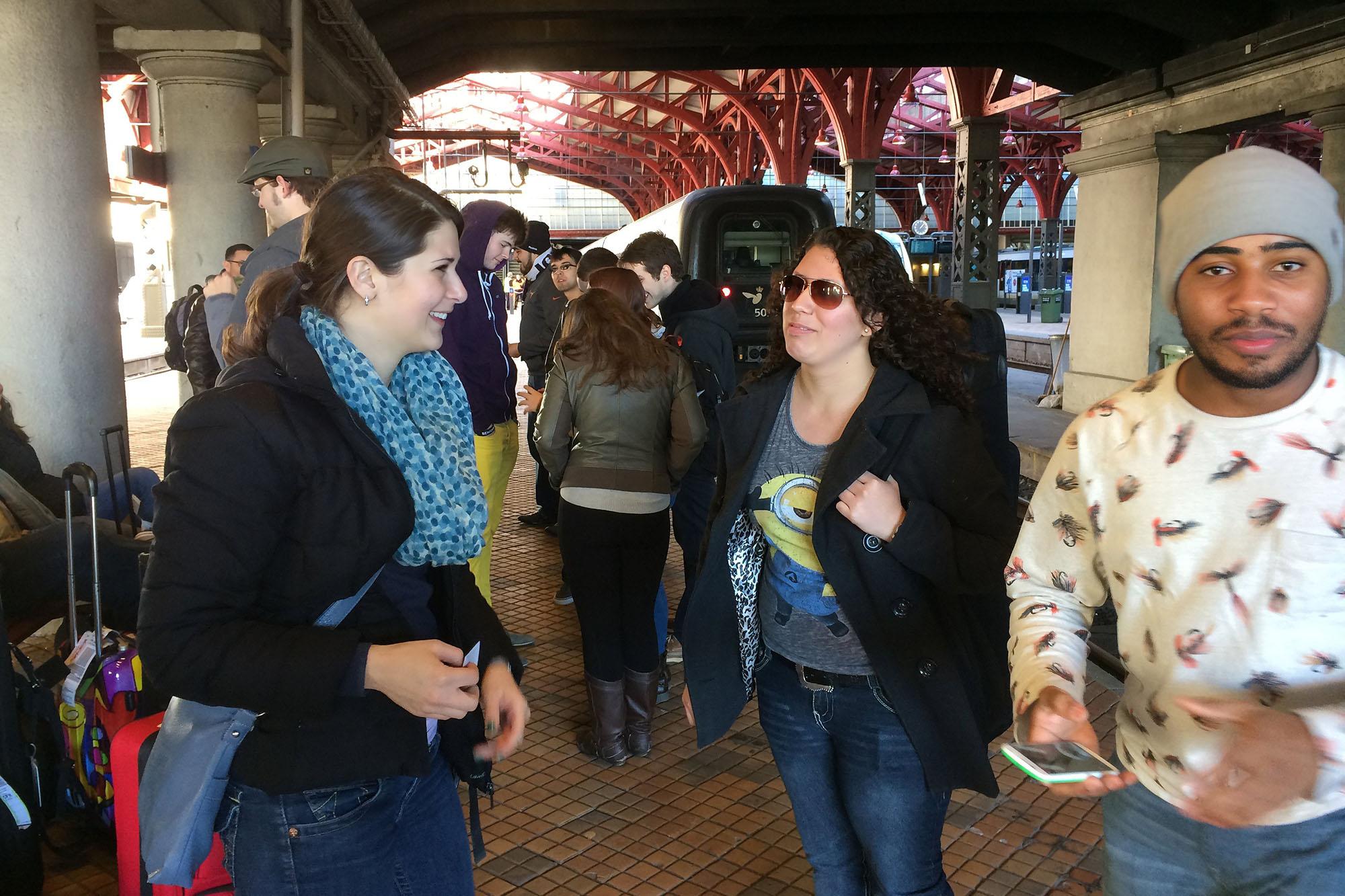 students waiting for a train in the Copenhagen train station