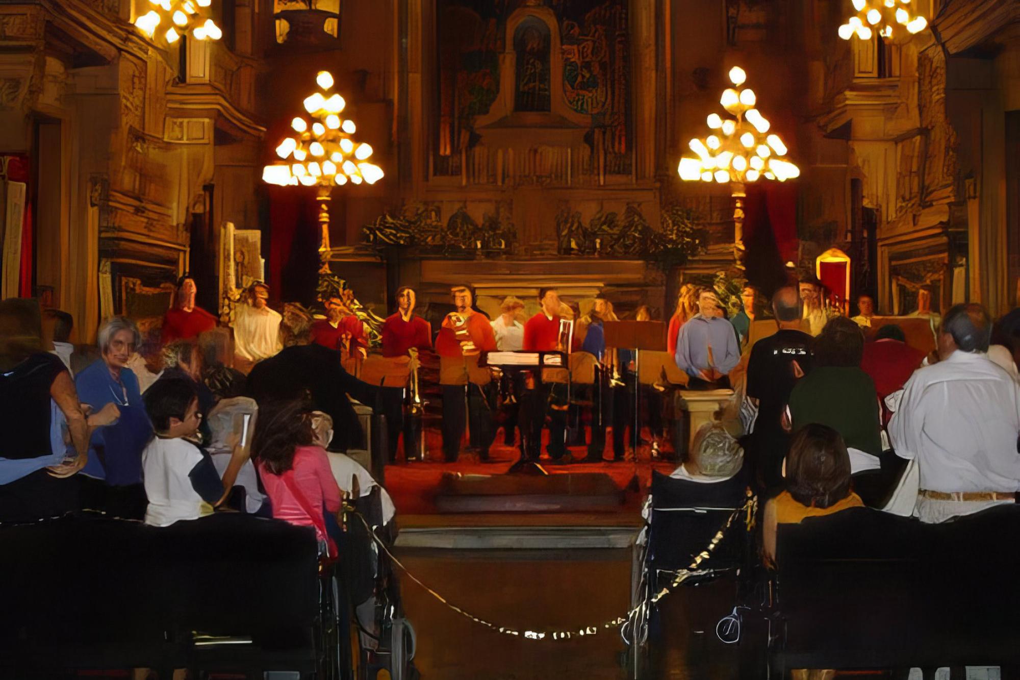 trombone choir performs an intimate concert in a small cathedral