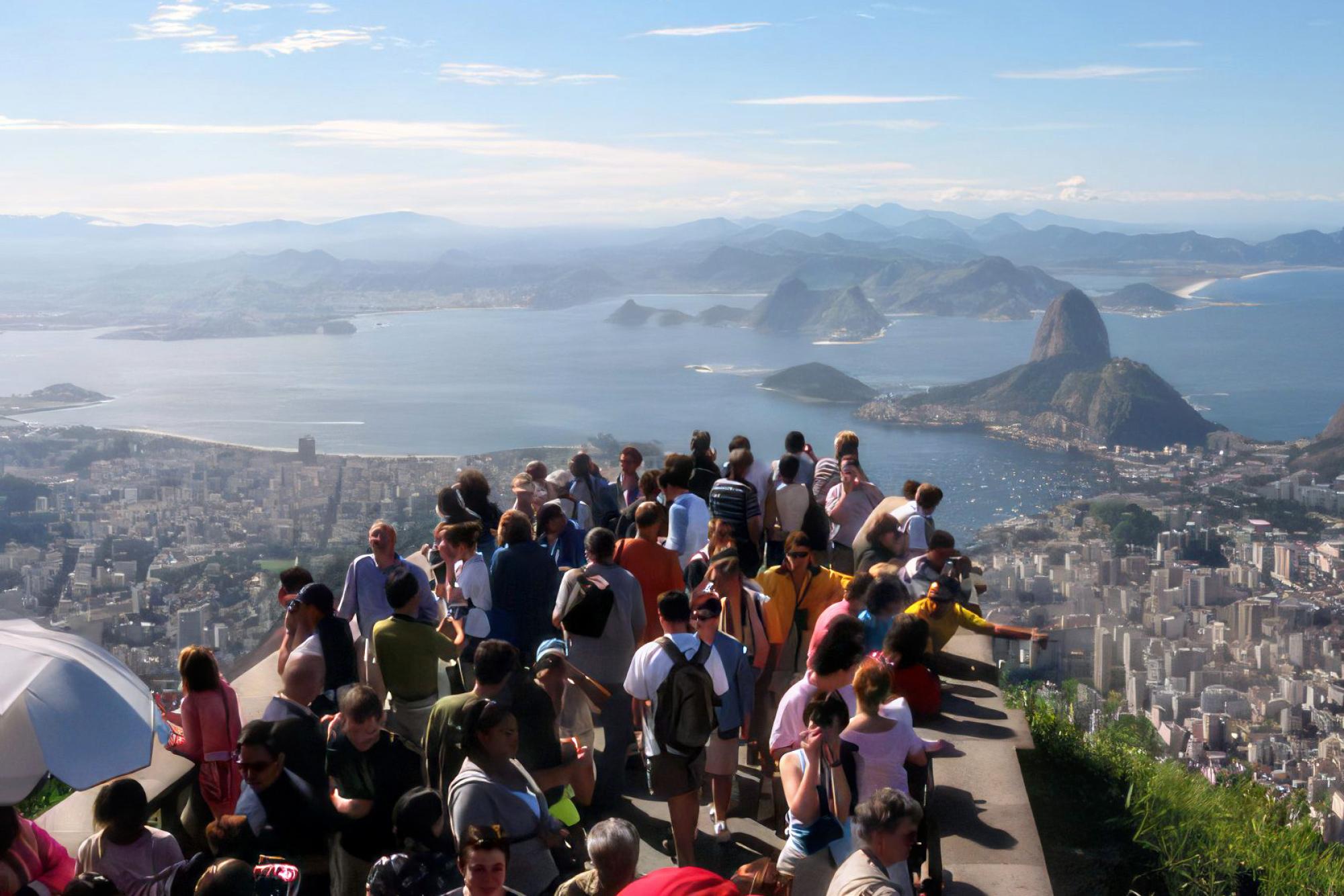 The trombone choir crowds onto a small overlook to see the city of Rio de Janeiro and the Atlantic Ocean