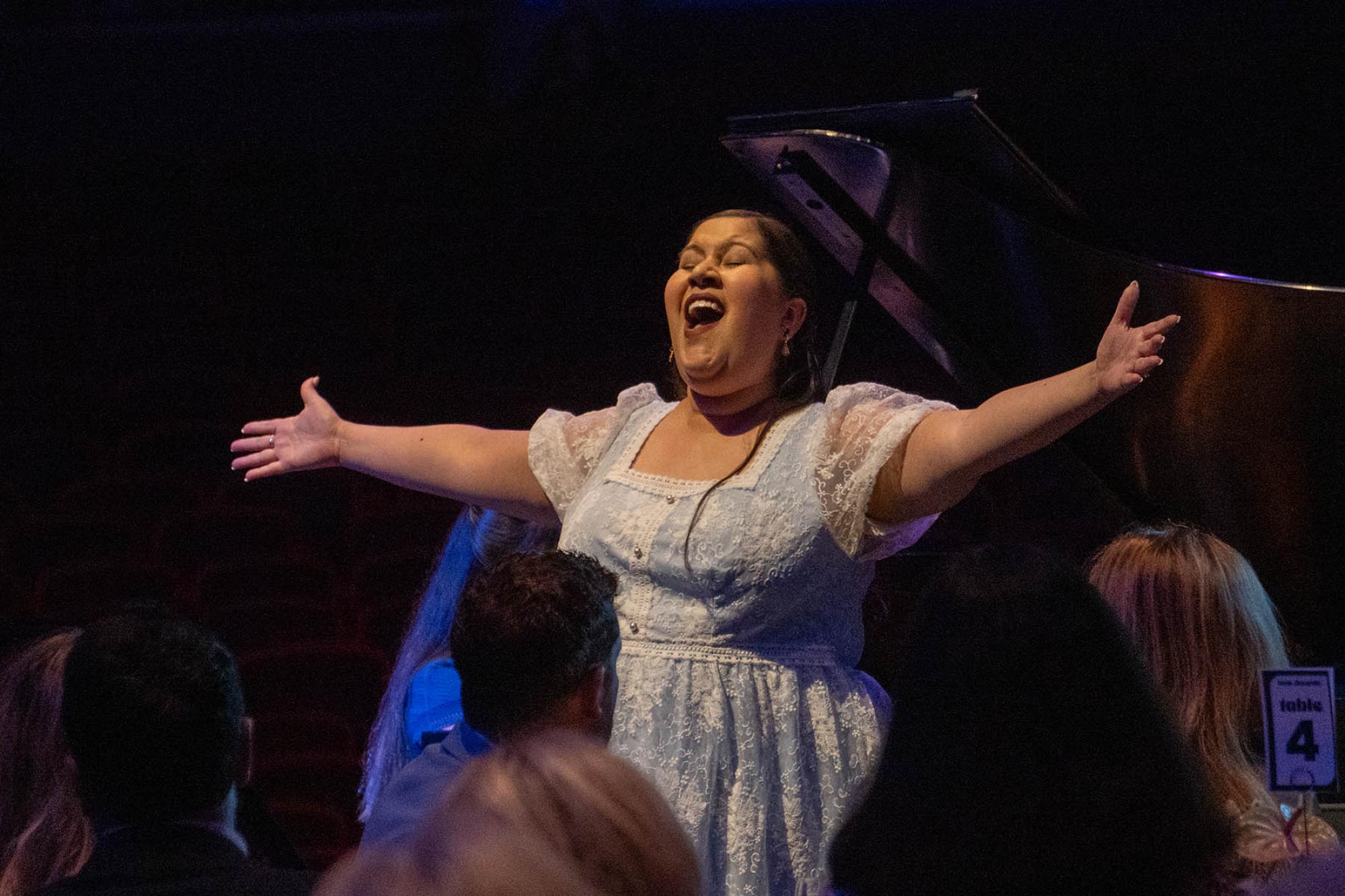 Liliana Guerrero singing on stage