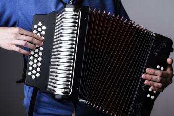 Closeup of a student playing an accordion