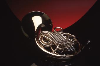 A horn with a black and red background