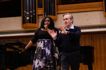 conductor James Conlon works with a student during a master class