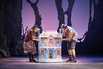 Hansel and Gretel find a tiny house in the woods, smaller than either of them.