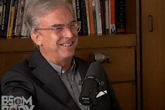 Jerry Junkin Sitting behind a Mic