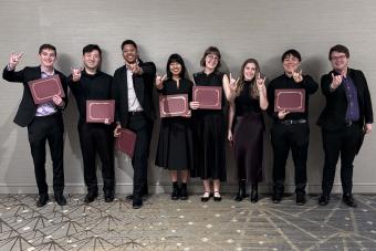 ZED saxphone quartet featuring Marina Sakellakis, Jacob Feldman, Connor O’Toole, and David Bennette, and Soha, string quartet composed of Mei Liu (violin), Chloe Yofan (violin), Thomas Gougeon (viola), and Katusaki Arakawa (cello), giving the hook em sign at MTNA Chamber Music String Competition.