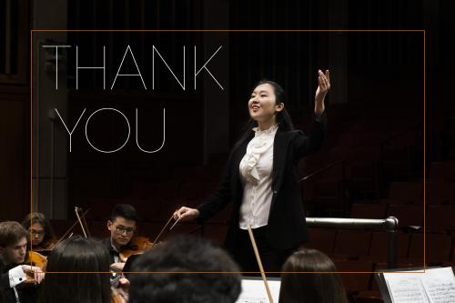 "Thank You" written over image with female conductor with orchestra