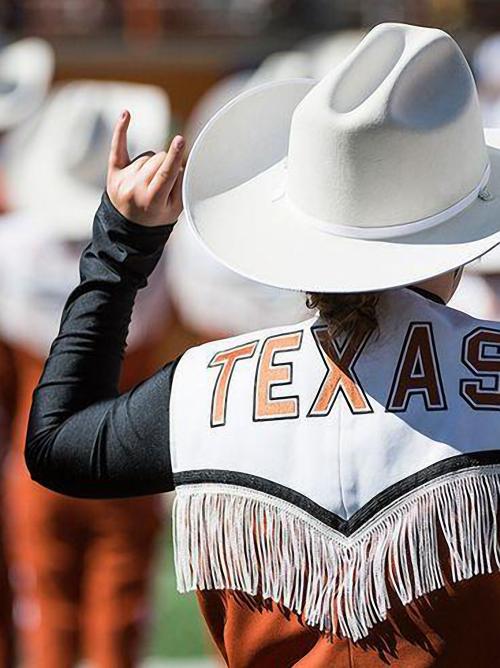 Longhorn Band Member makes Hook'em horns