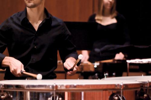 A timpani performer on the Bates Recital Hall Stage