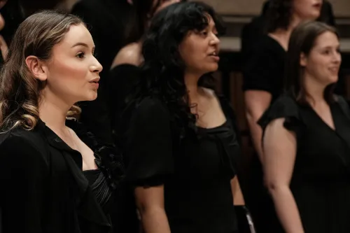 the Treble Chorus performs on stage