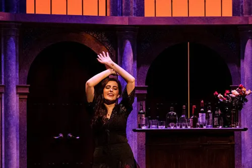Carmen seductively dances on stage