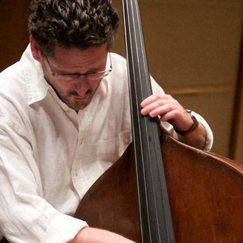 John Fremgen plays double bass during a performance