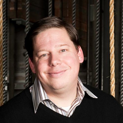 Portrait of Garnett Bruce, backstage in a black box theater