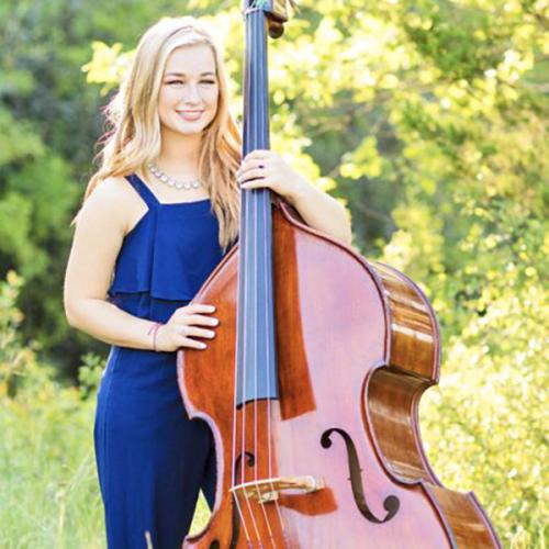 a headshot of Alyse With her Double Bass