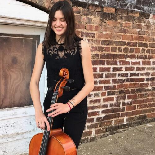 a headshot of Madison Garrett with her cello