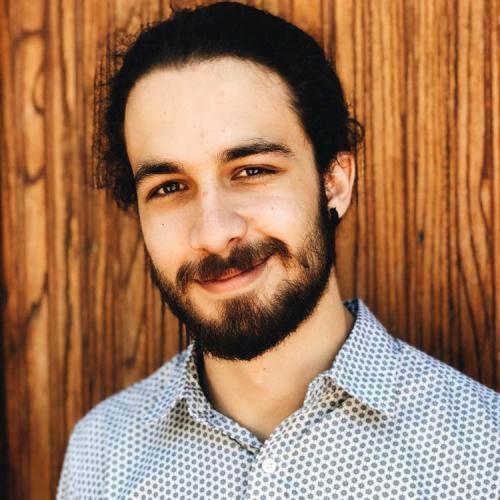 a headshot of Dimitris Gkoulimaris