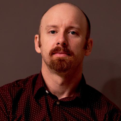 A headshot of Russell Podgorsek