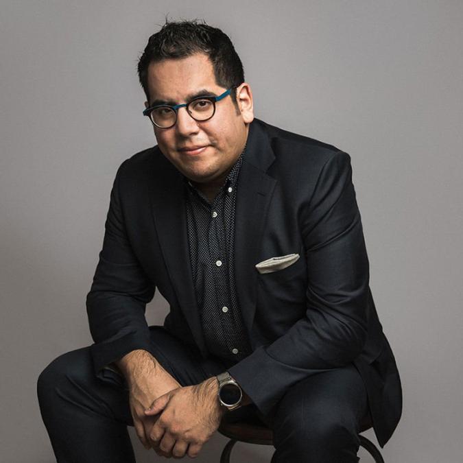 A headshot of Julio Elizalde