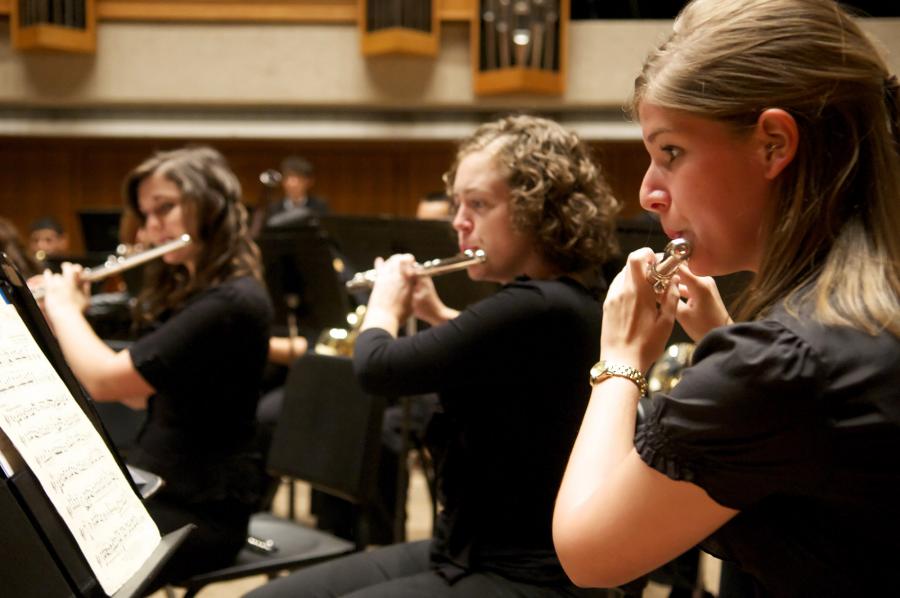 Flutes playing in concert band concert