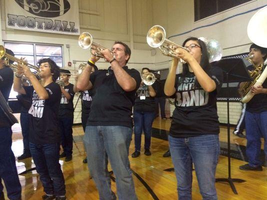 Alan Guckian performing with his students