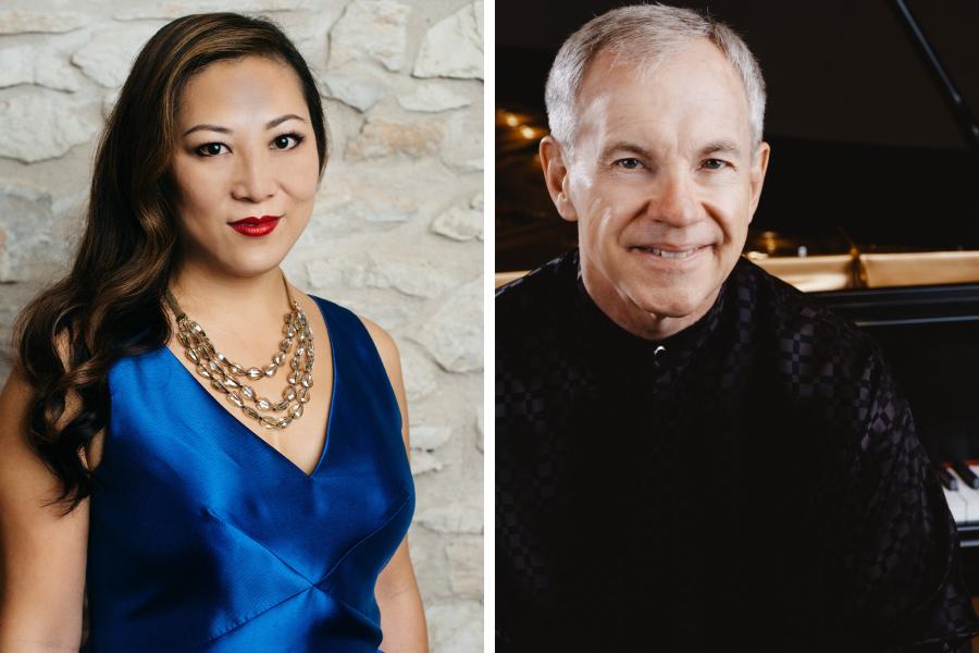 On the left, an Asian woman wearing red lipstick and a blue dress smiles. On the right, a gray-haired man wearing a black shirt smiles.