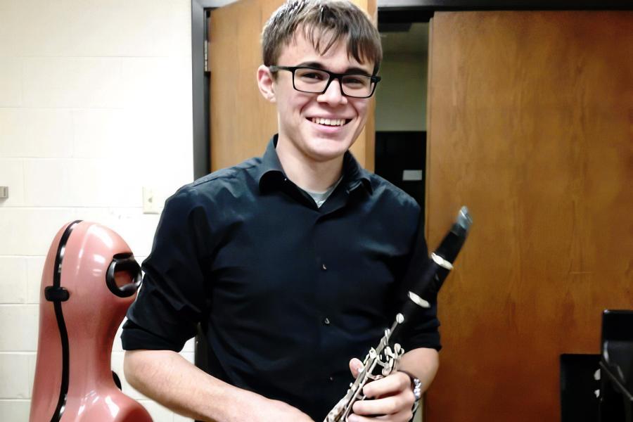 Thomas Rodiguez holds his clarinet