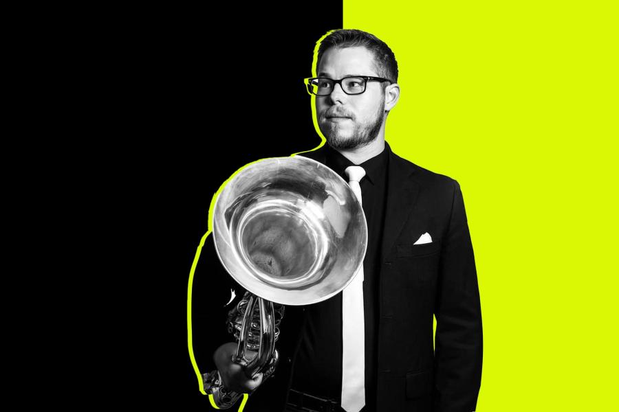 a headshot of Alex Avila with his tuba.