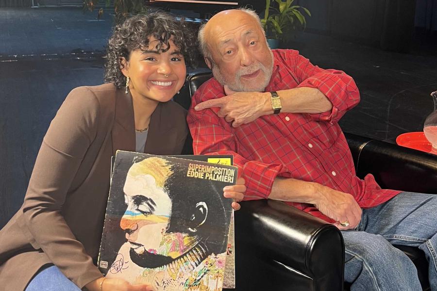 Ailish Quinones and Eddie Palmieri posing for a picture