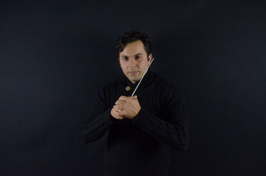 Farkhad Khudyev holds his conducting baton