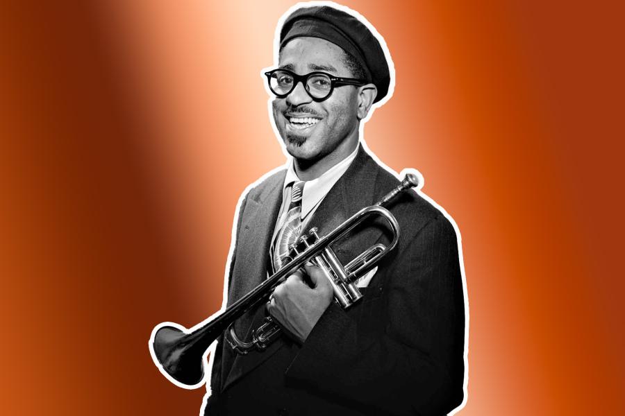 Black and white photo of Dizzy Gillespie in front of an orange background.