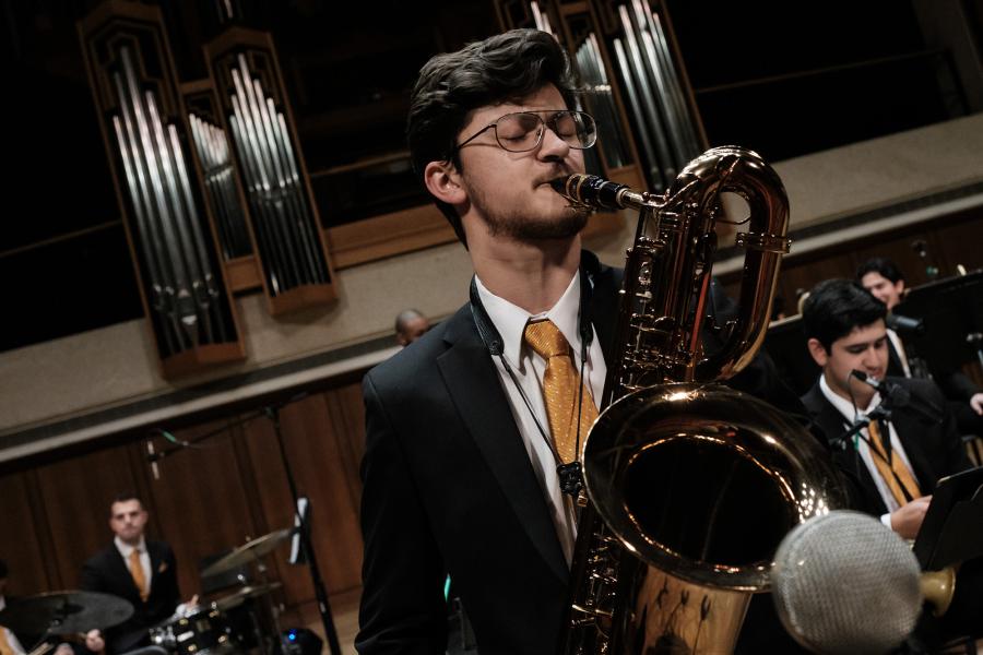 A jazz saxophone student playing with UT Jazz Orchestra.