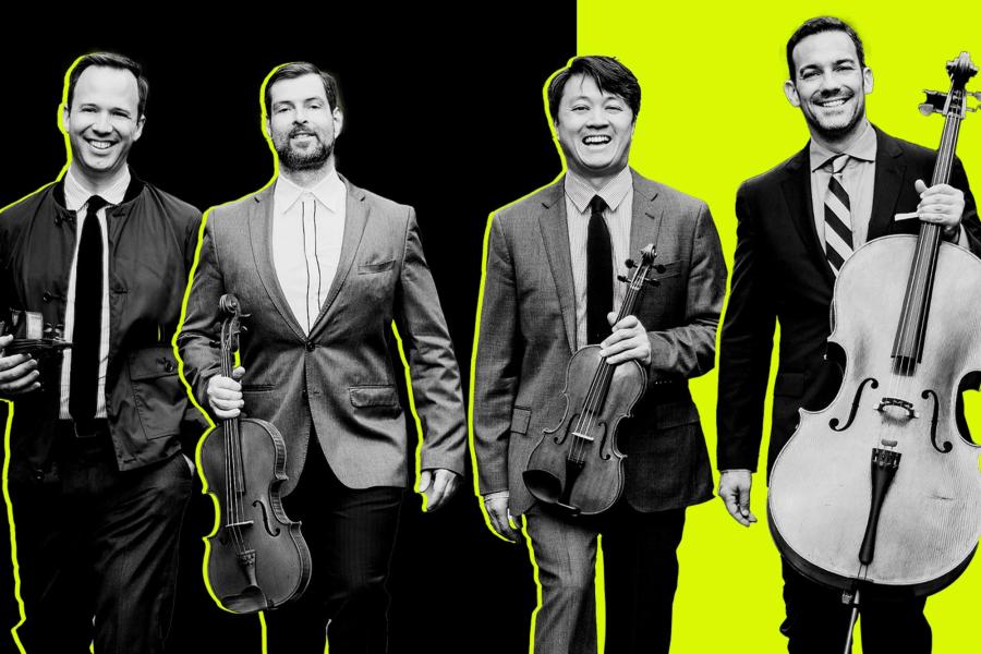 A black and white photo of members of the Miró Quartet holding their instruments in front of a black and neon green background.