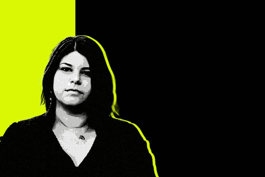 Black and white photo of composer Alyssa Weinberg in front of a black and neon lime background.