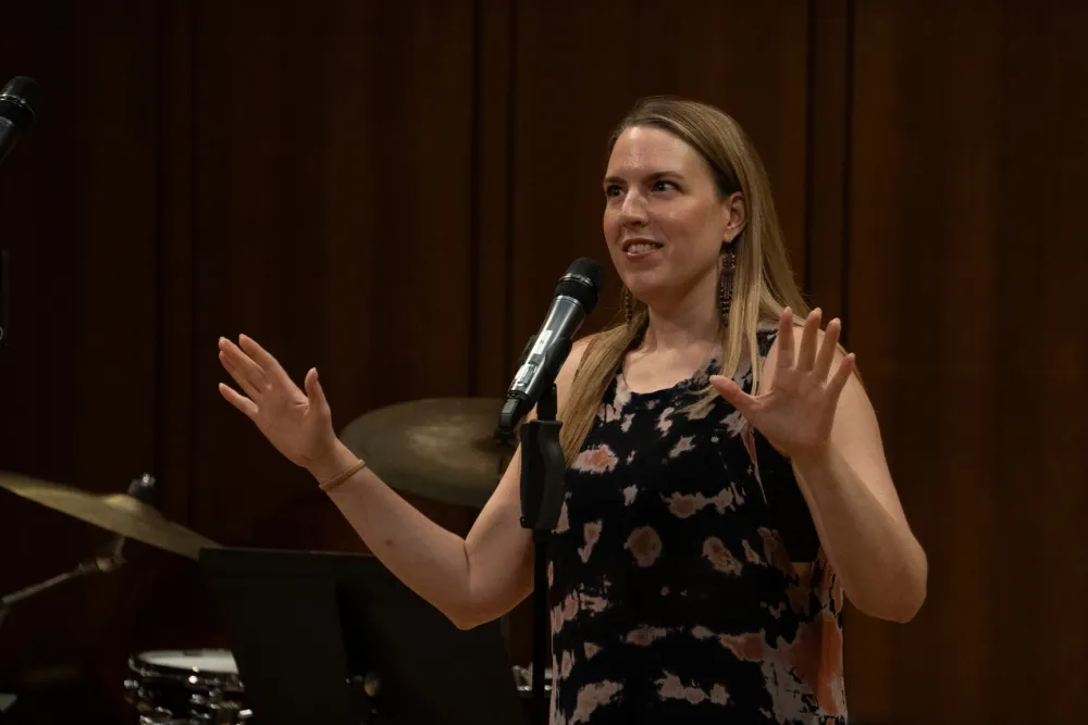 Page Stephens talks into a mic