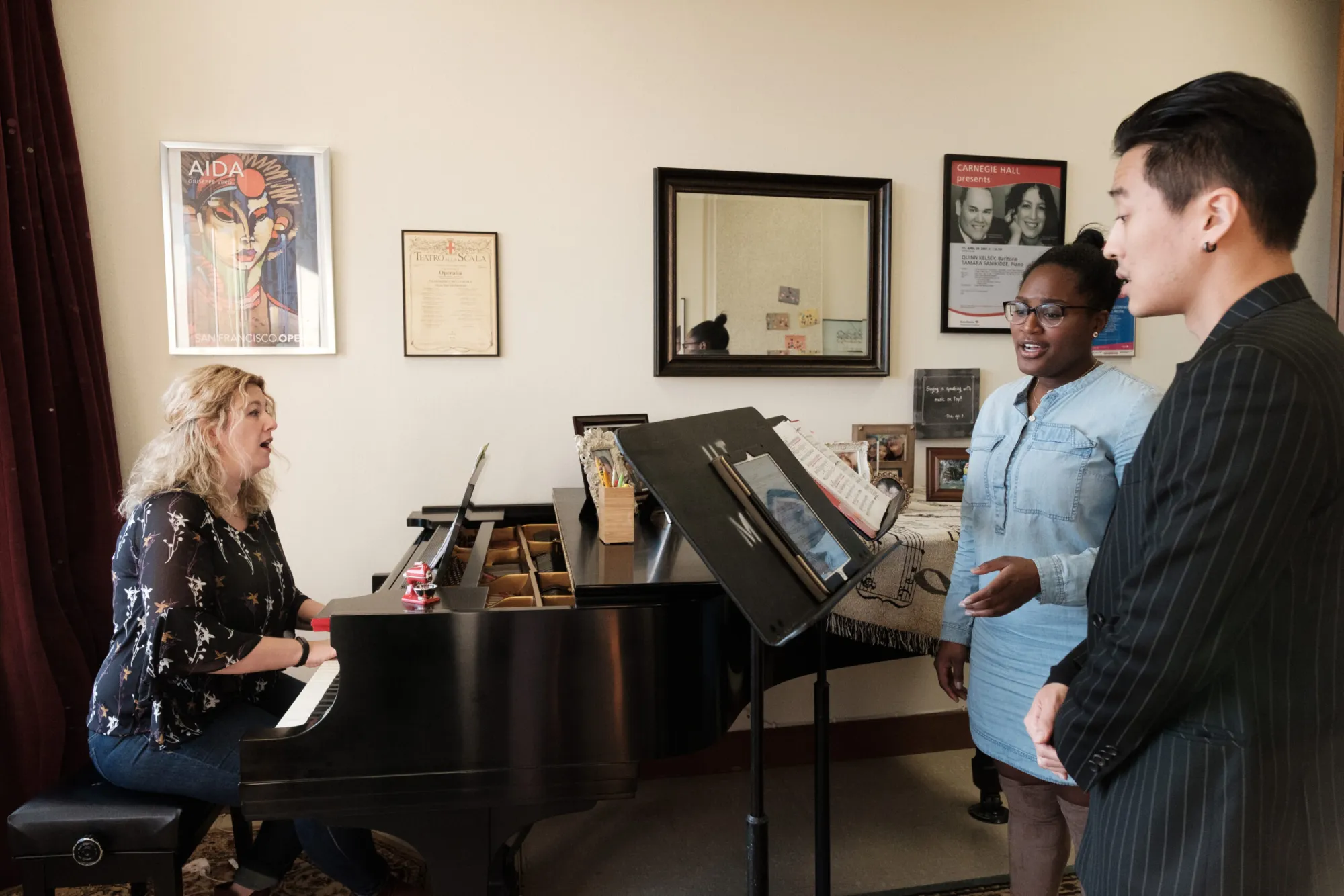 Professor Tamara Sanikidze works with two opera students in her studio