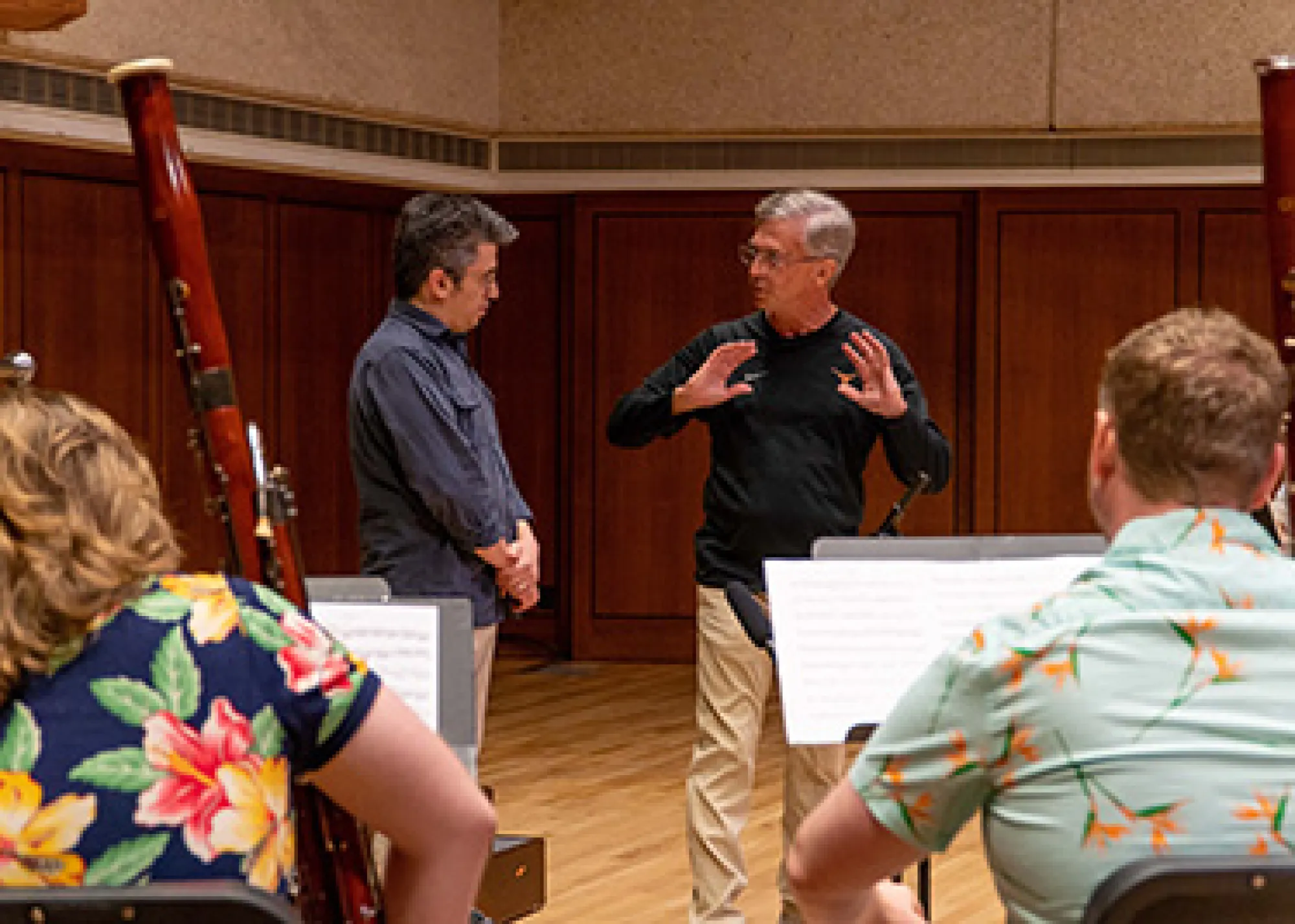 Man instructing conductor