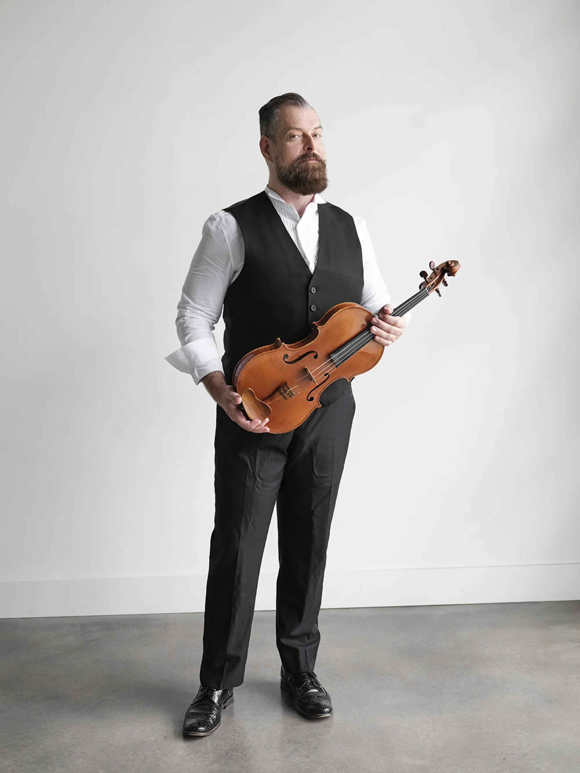 John Largess with his viola. 