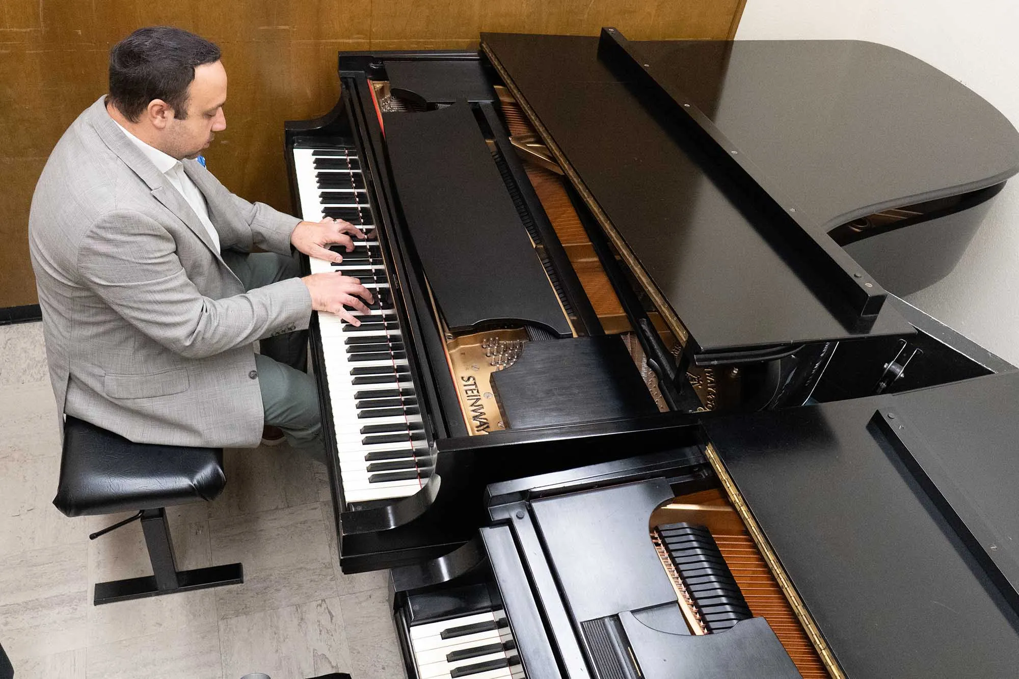 Ross Margitza playing a piano