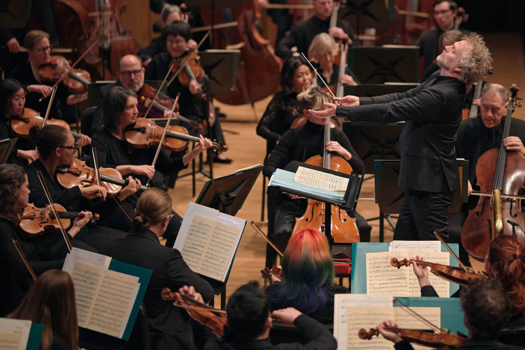 An orchestra playing on stage