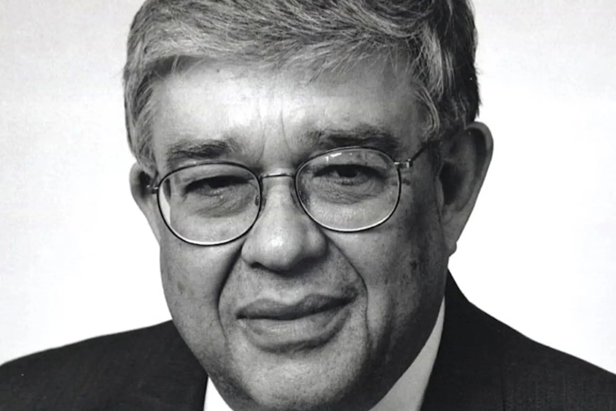 Robert Freeman in front of a white background